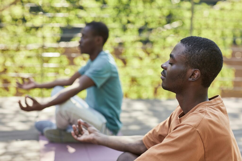 two men practicing mindfulness meditation